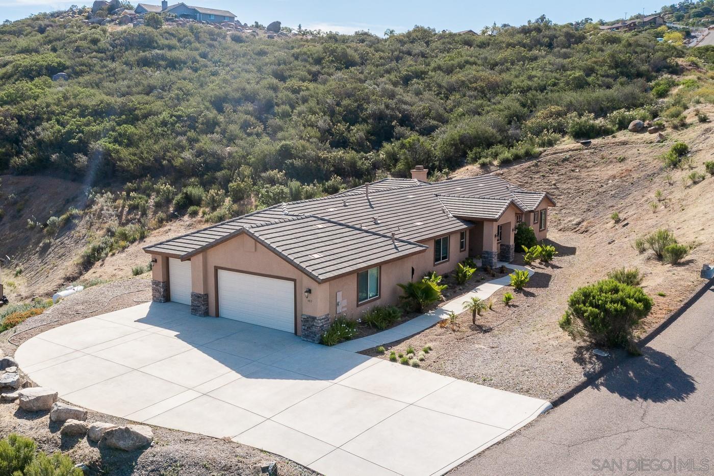 483 Alpine Trail Road Alpine, CA 91901 - Photo 1 of 42 an aerial view of a house with a garden