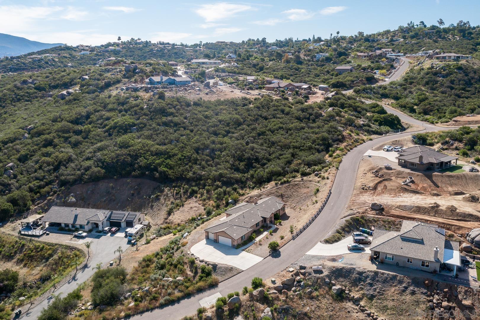 483 Alpine Trail Road Alpine, CA 91901 - Photo 4 of 42 an aerial view of residential houses with outdoor space
