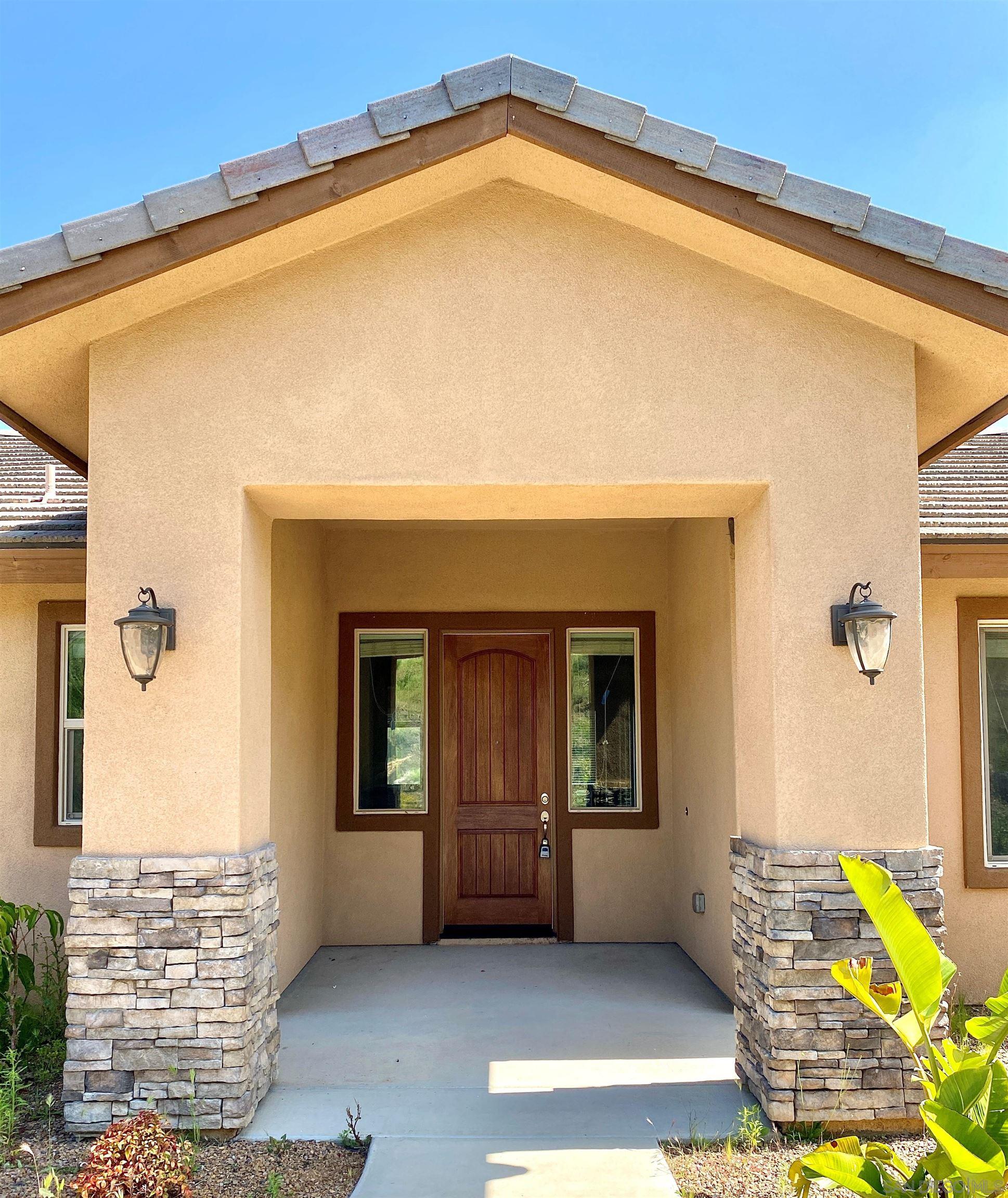 483 Alpine Trail Road Alpine, CA 91901 - Photo 6 of 42 a view of an entrance of the house