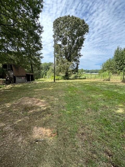 441 Patrick Mill Road Southwest Winder, GA 30680 - Photo 18 of 19 a view of a field with an trees