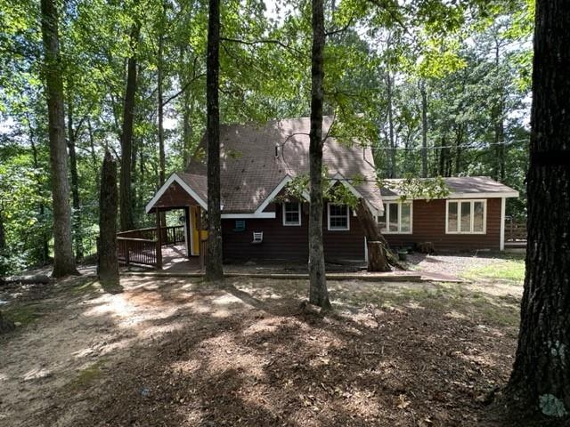 441 Patrick Mill Road Southwest Winder, GA 30680 - Photo 2 of 19 a view of a house with a tree in the yard