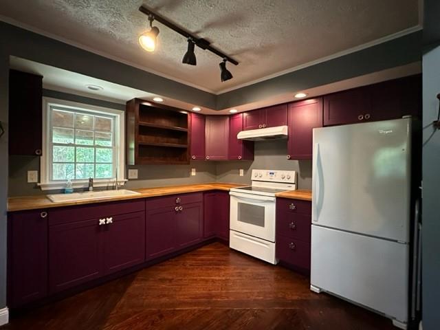 441 Patrick Mill Road Southwest Winder, GA 30680 - Photo 5 of 19 a kitchen with granite countertop a sink stainless steel appliances and counter space