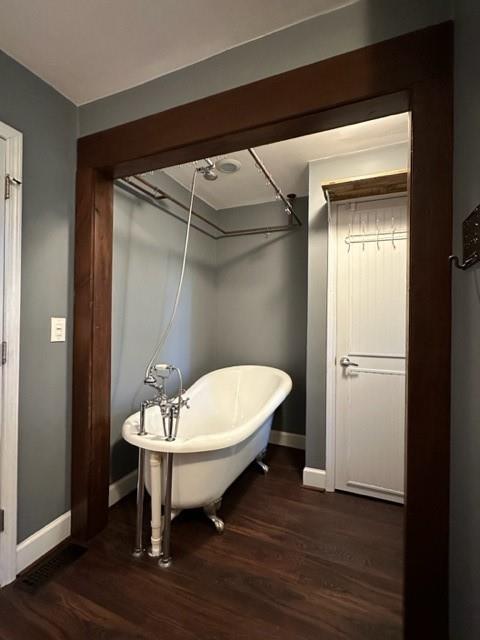 441 Patrick Mill Road Southwest Winder, GA 30680 - Photo 10 of 19 a bathroom with a sink a mirror and a shower