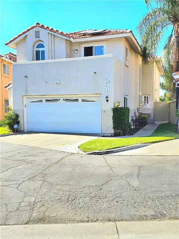 a view of a house with a swimming pool