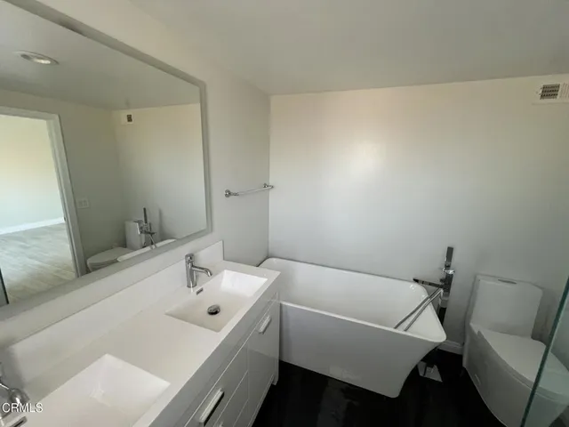 a bathroom with a sink and a bathtub