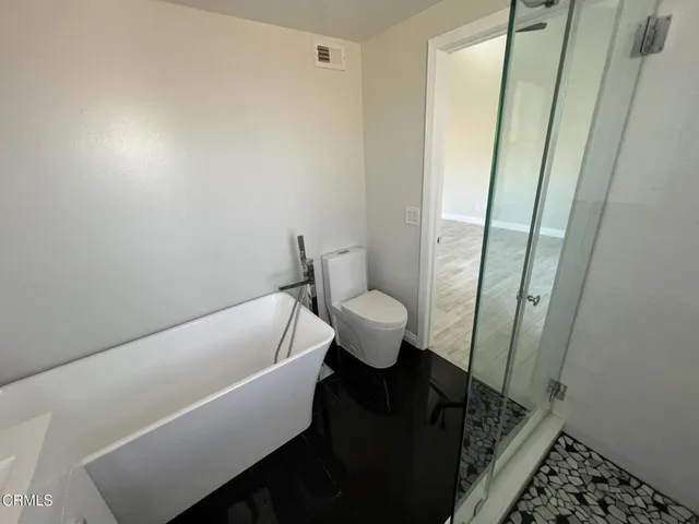 a bathroom with a sink and a bathtub