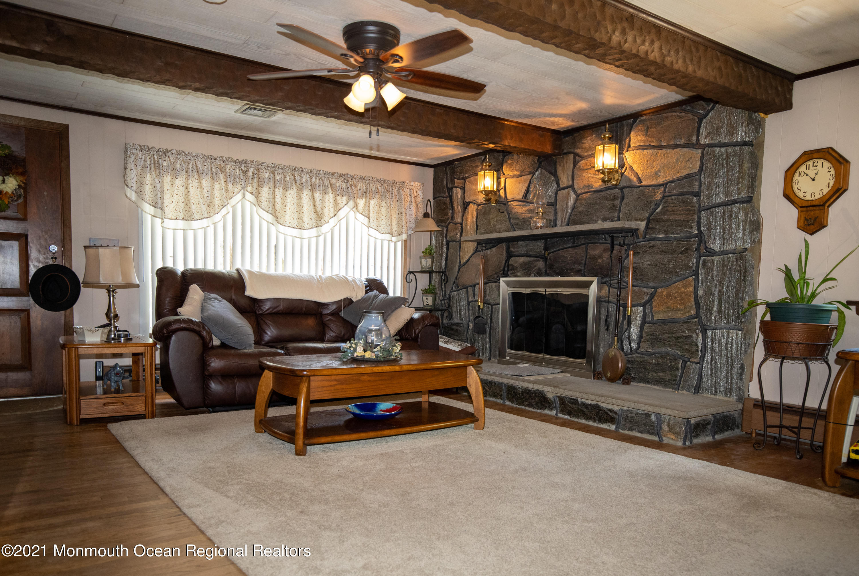 4 Smith Street Howell, NJ 07731 - Photo 11 of 27 a living room with furniture a window and a fireplace
