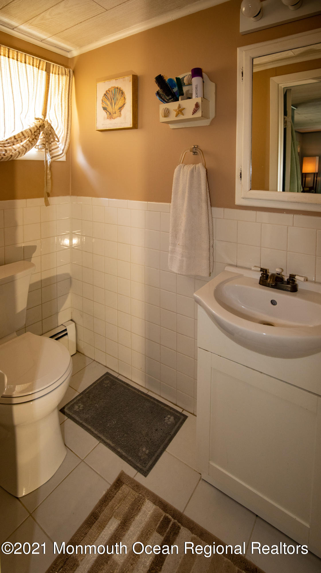 4 Smith Street Howell, NJ 07731 - Photo 16 of 27 a bathroom with a toilet and a sink