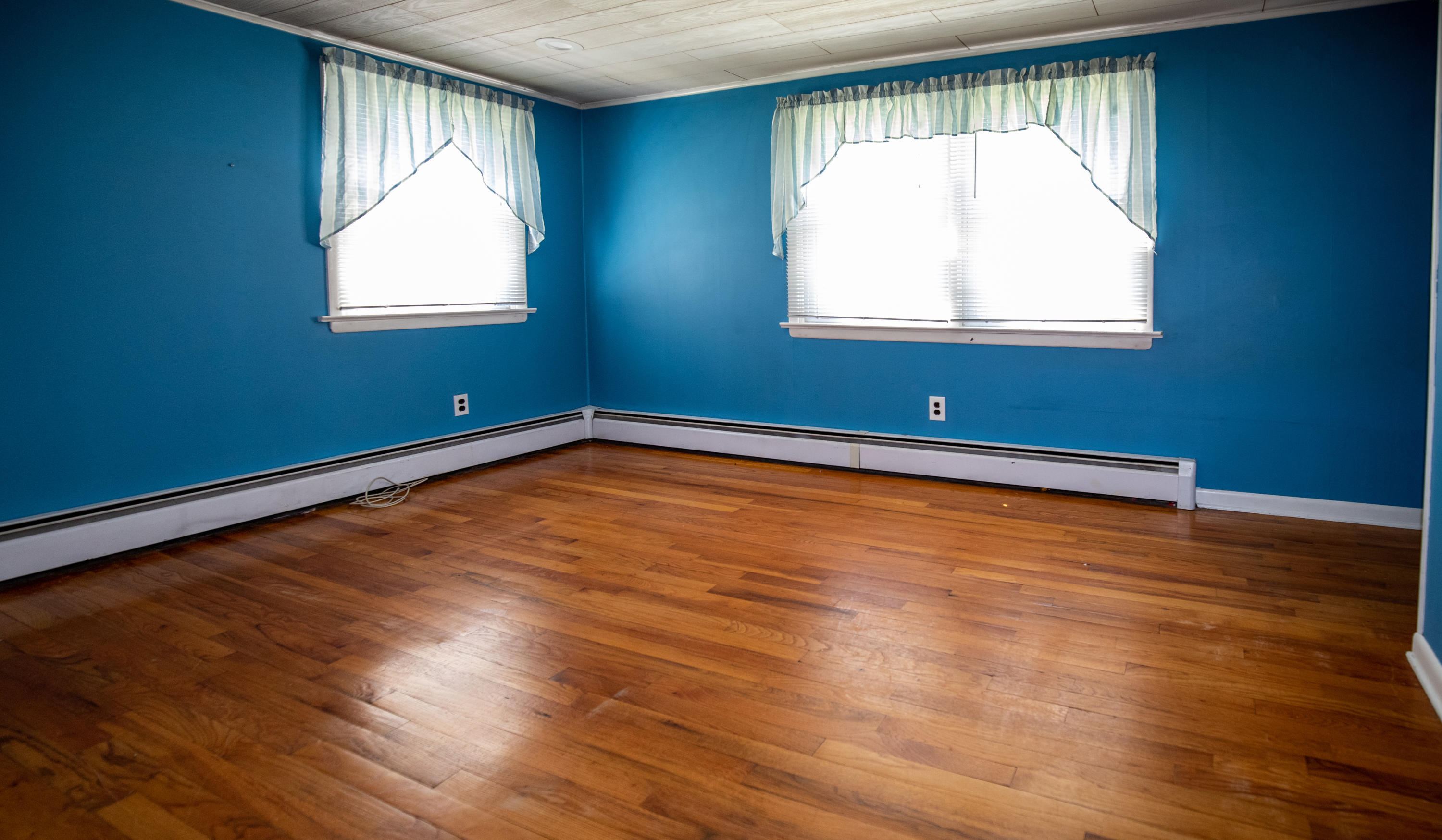 4 Smith Street Howell, NJ 07731 - Photo 17 of 27 an empty room with wooden floor and windows