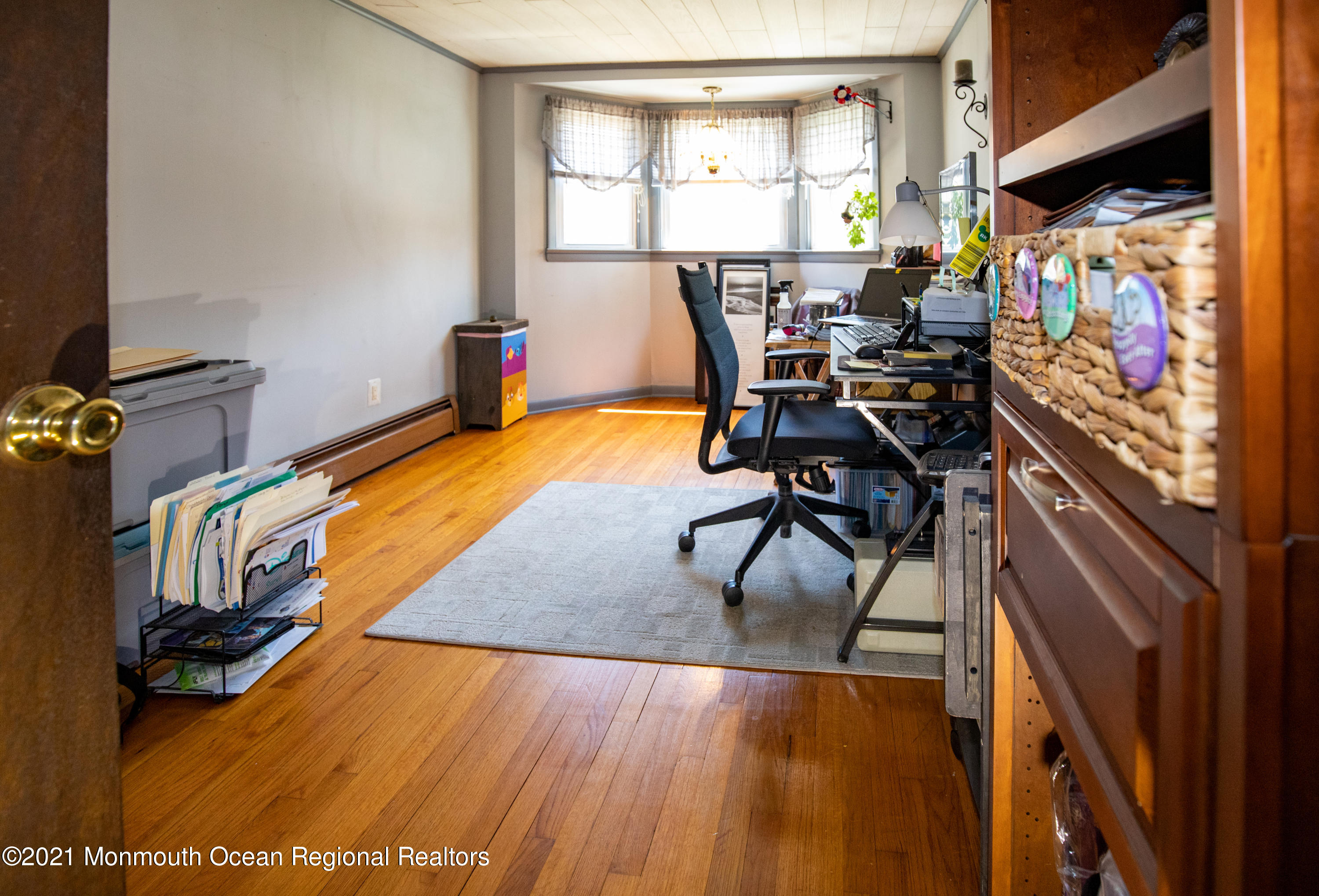 4 Smith Street Howell, NJ 07731 - Photo 18 of 27 a view of a workspace with furniture and a window