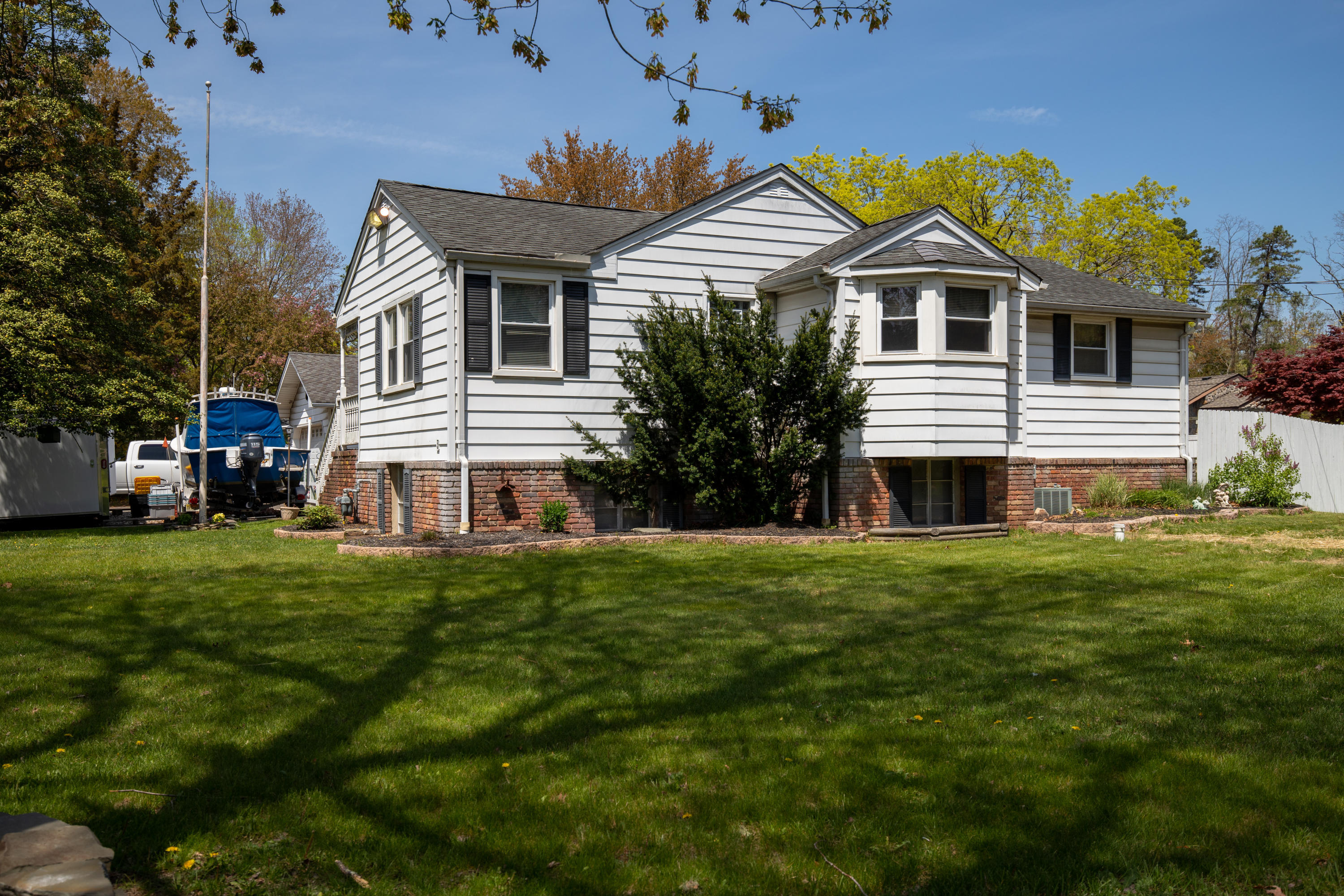 4 Smith Street Howell, NJ 07731 - Photo 4 of 27 a front view of a house with a yard