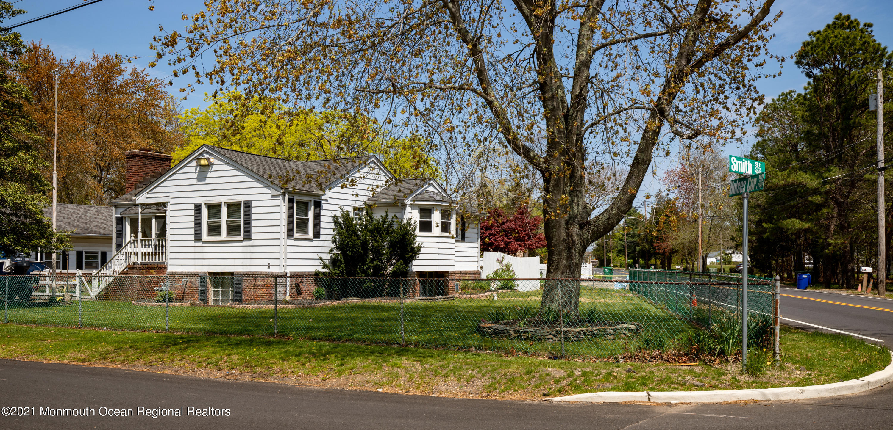 4 Smith Street Howell, NJ 07731 - Photo 5 of 27 a front view of a house with a yard