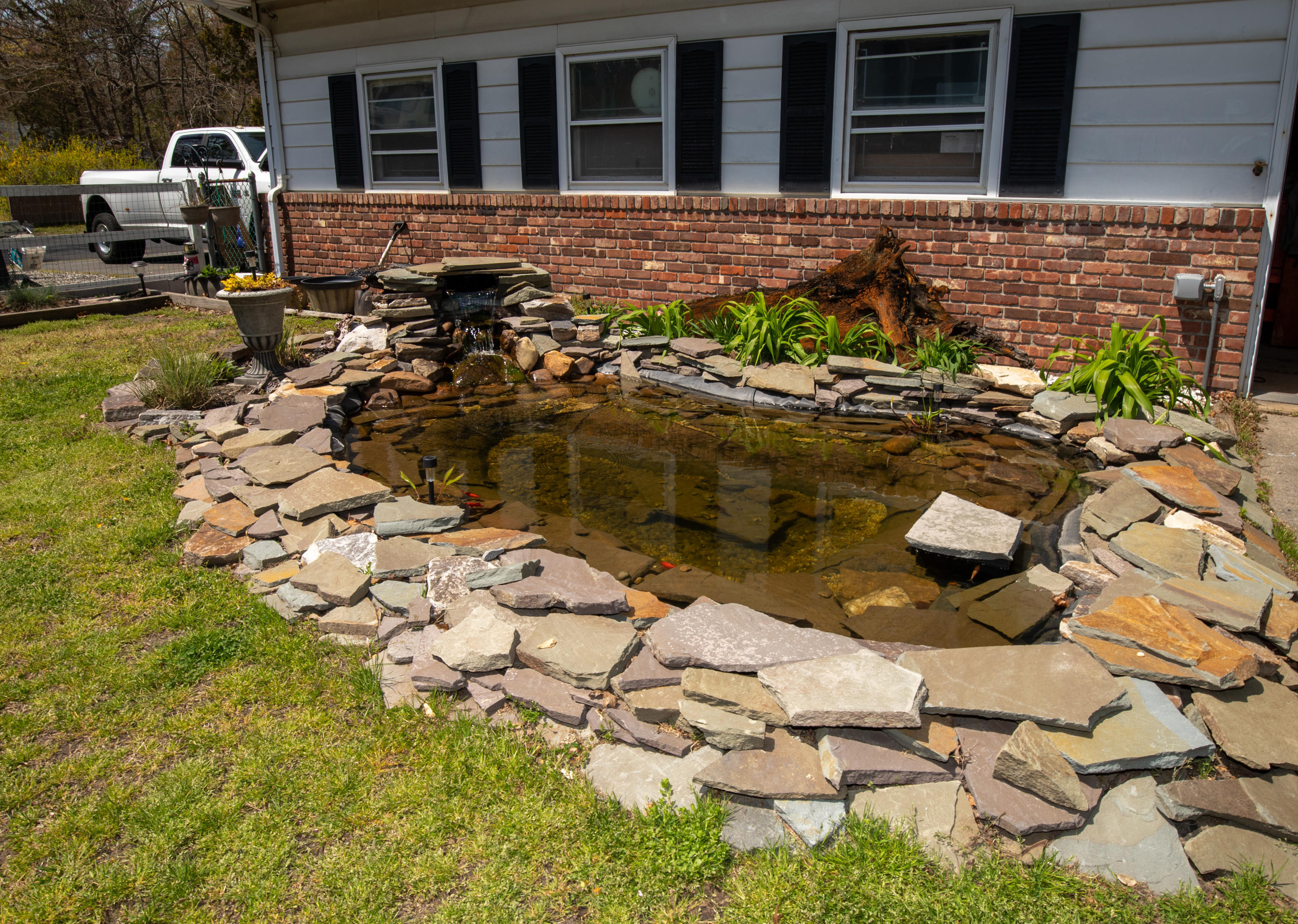 4 Smith Street Howell, NJ 07731 - Photo 7 of 27 a front view of a house with parking