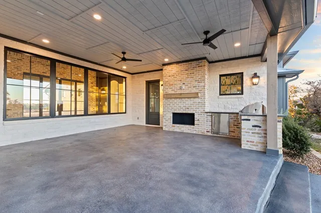 a view of an empty room with a large window