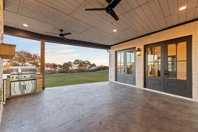 a view of a park with large trees