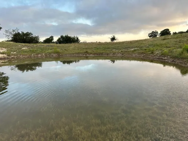a view of outdoor space with deck and yard