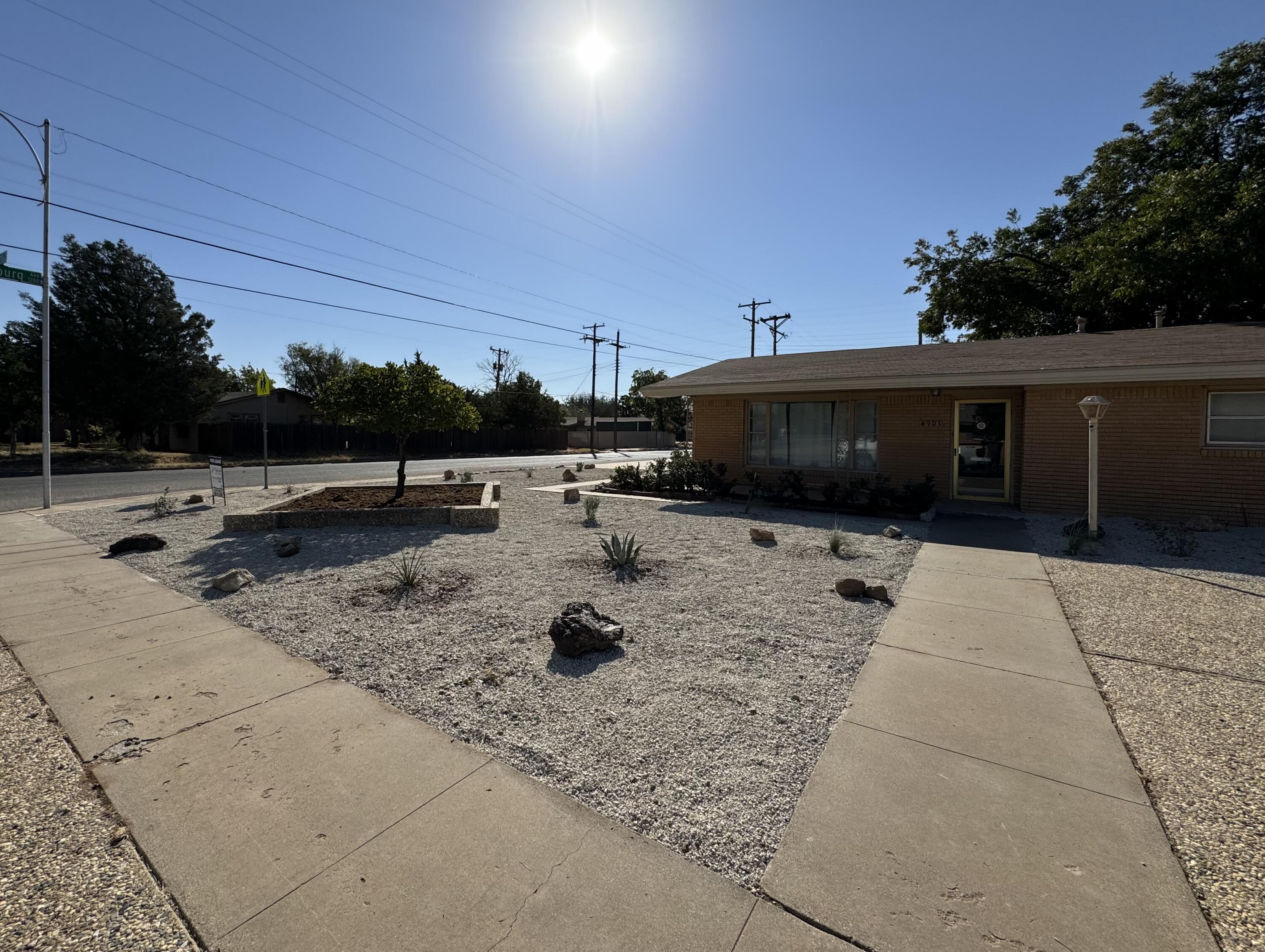 4901 12th Street Lubbock, TX 79416 - Photo 2 of 7 a view of back yard of the house