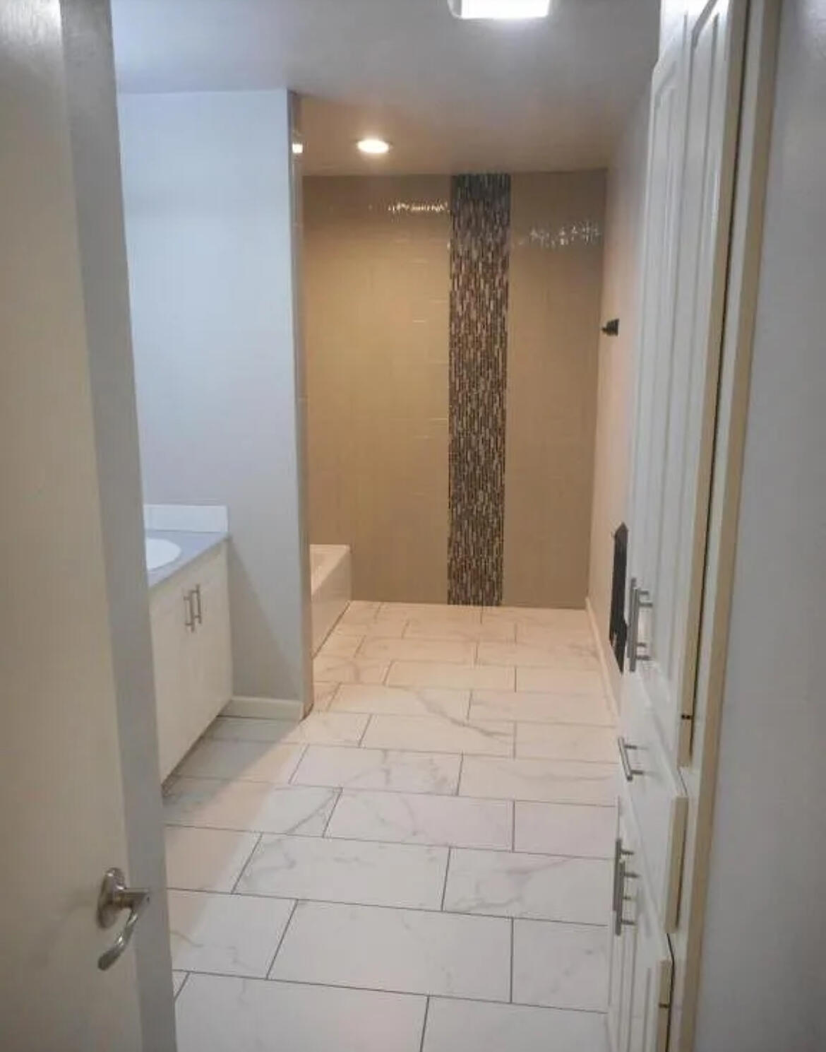 4901 12th Street Lubbock, TX 79416 - Photo 6 of 7 a bedroom with a bed and a toilet