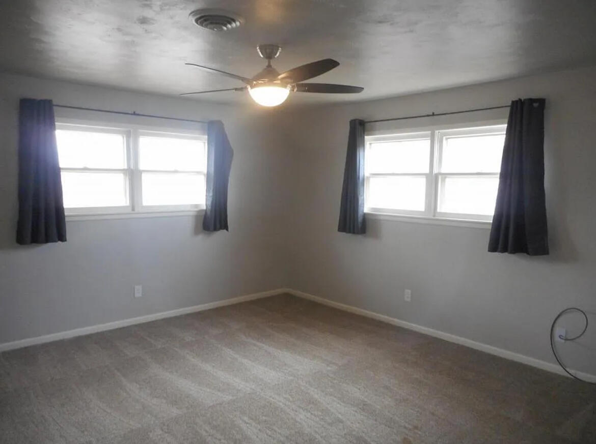 4901 12th Street Lubbock, TX 79416 - Photo 7 of 7 an empty room with a window