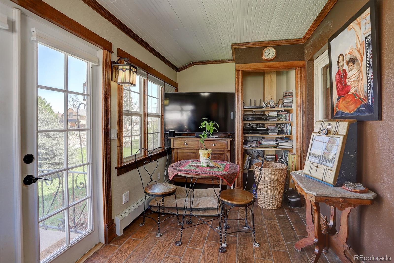 153 Park Avenue Fort Lupton, CO 80621 - Photo 15 of 35 a room with furniture and wooden floor