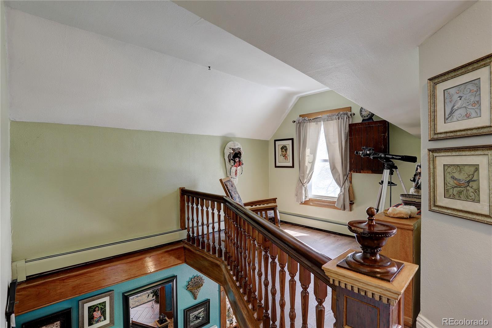 153 Park Avenue Fort Lupton, CO 80621 - Photo 21 of 35 a view of a hallway with workspace