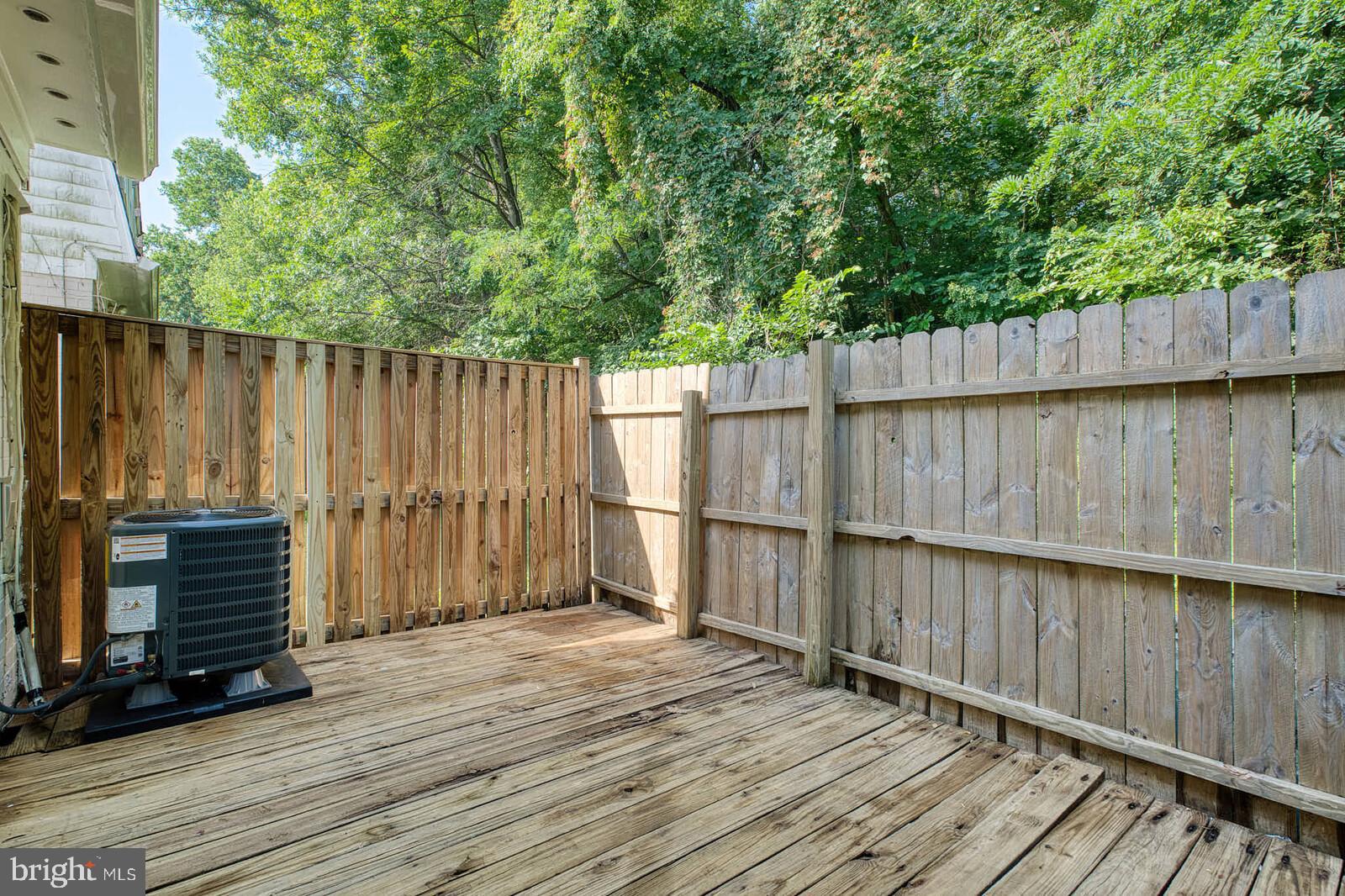 1842 Dutch Village Drive, Unit R264 Landover, MD 20785 - Photo 25 of 26 a view of outdoor space with wooden deck