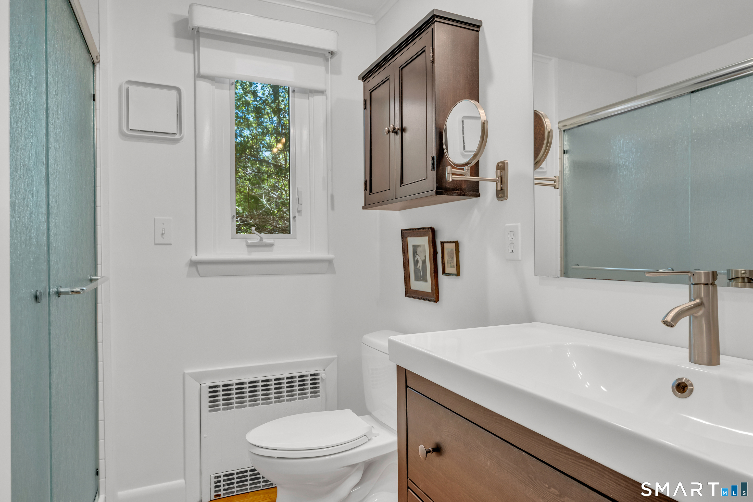 81 Main Street Chester, CT 06412 - Photo 11 of 39 First floor bath with tiled shower.