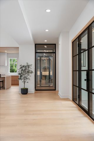 a view of a dining room with furniture and window