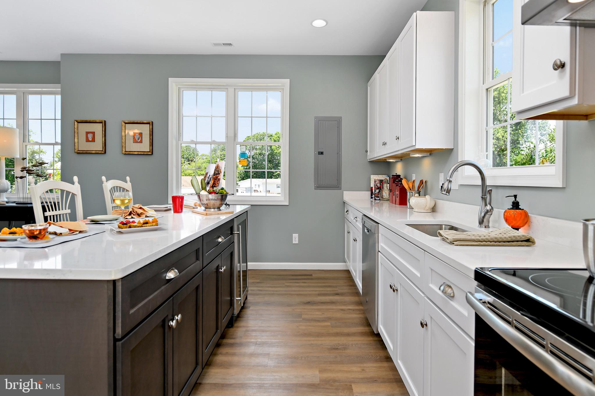 31307 Point Reyes Lane, Unit 16 Ocean View, DE 19970 - Photo 13 of 50 Gourmet kitchen features quartz countertops