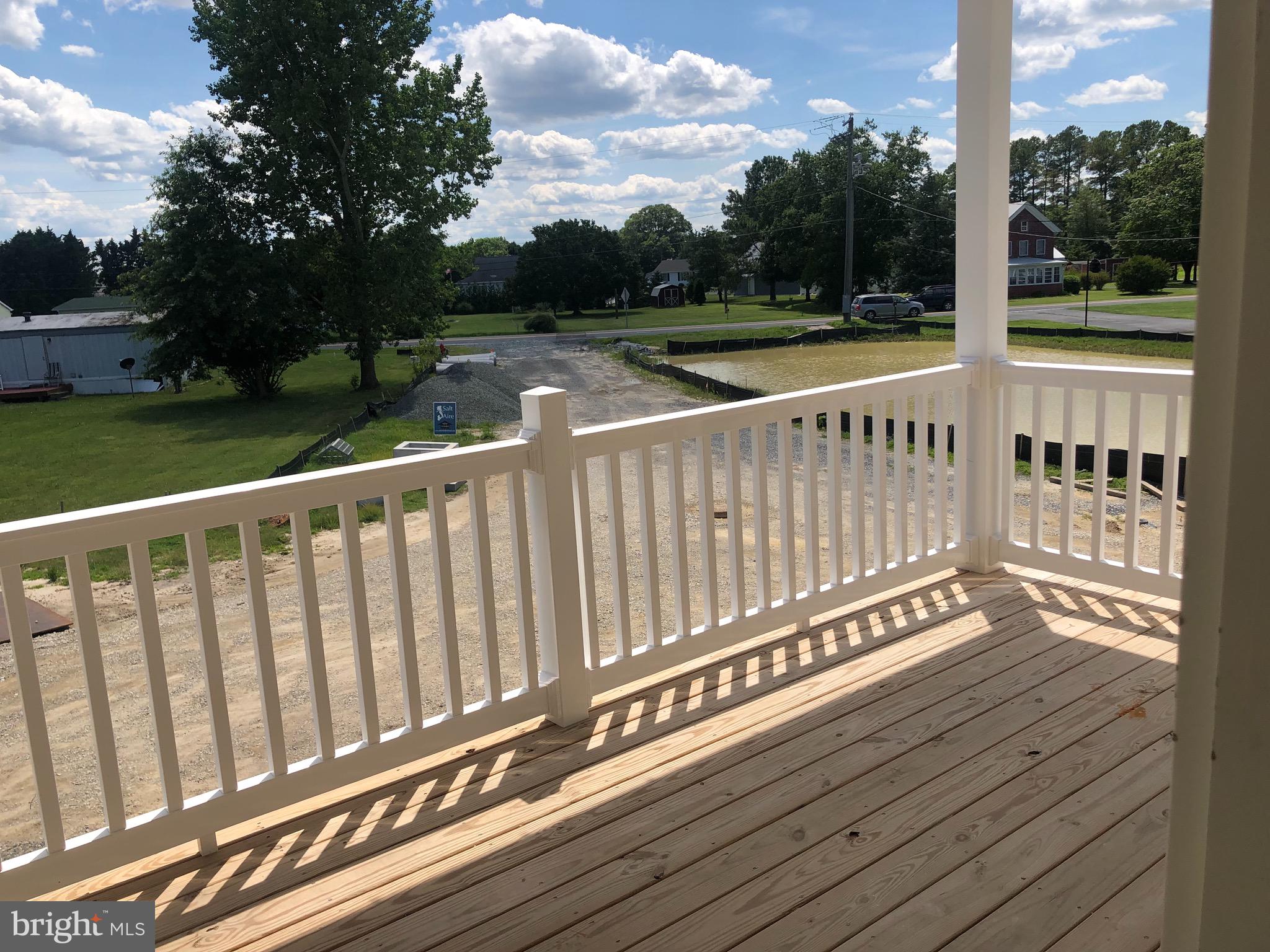 31307 Point Reyes Lane, Unit 16 Ocean View, DE 19970 - Photo 47 of 50 Standard covered front porch