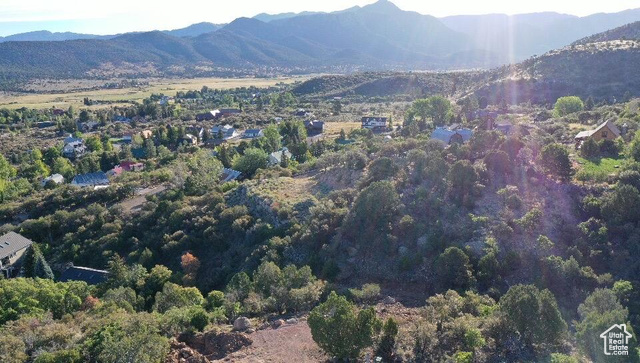 515 South Oakridge Road Pine Valley, UT 84781 - Photo 10 of 23 Aerial view of property and surrounding area with a mountainous background
