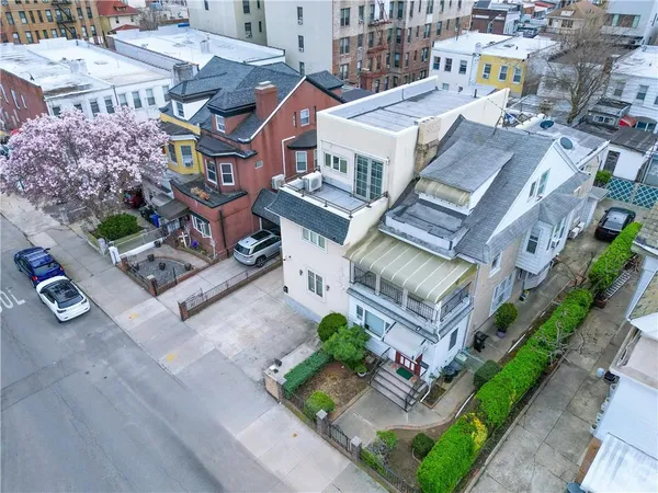 an aerial view of a building with a city view