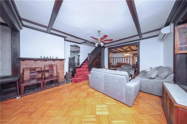 a bed room with a bed and a chair