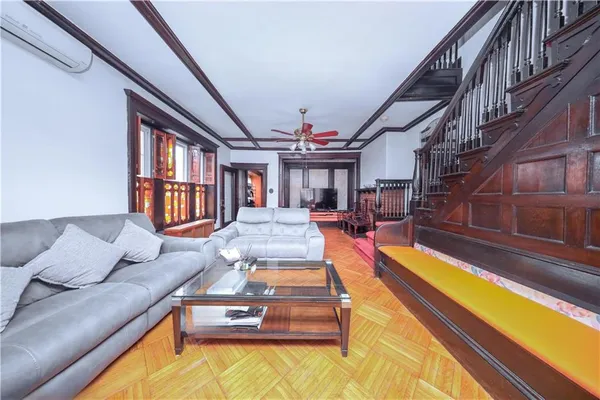 a view of swimming pool with seating area