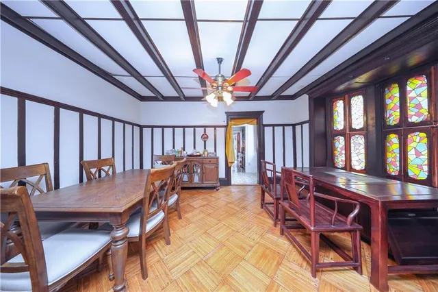 a view of a dining room with furniture window and outside view