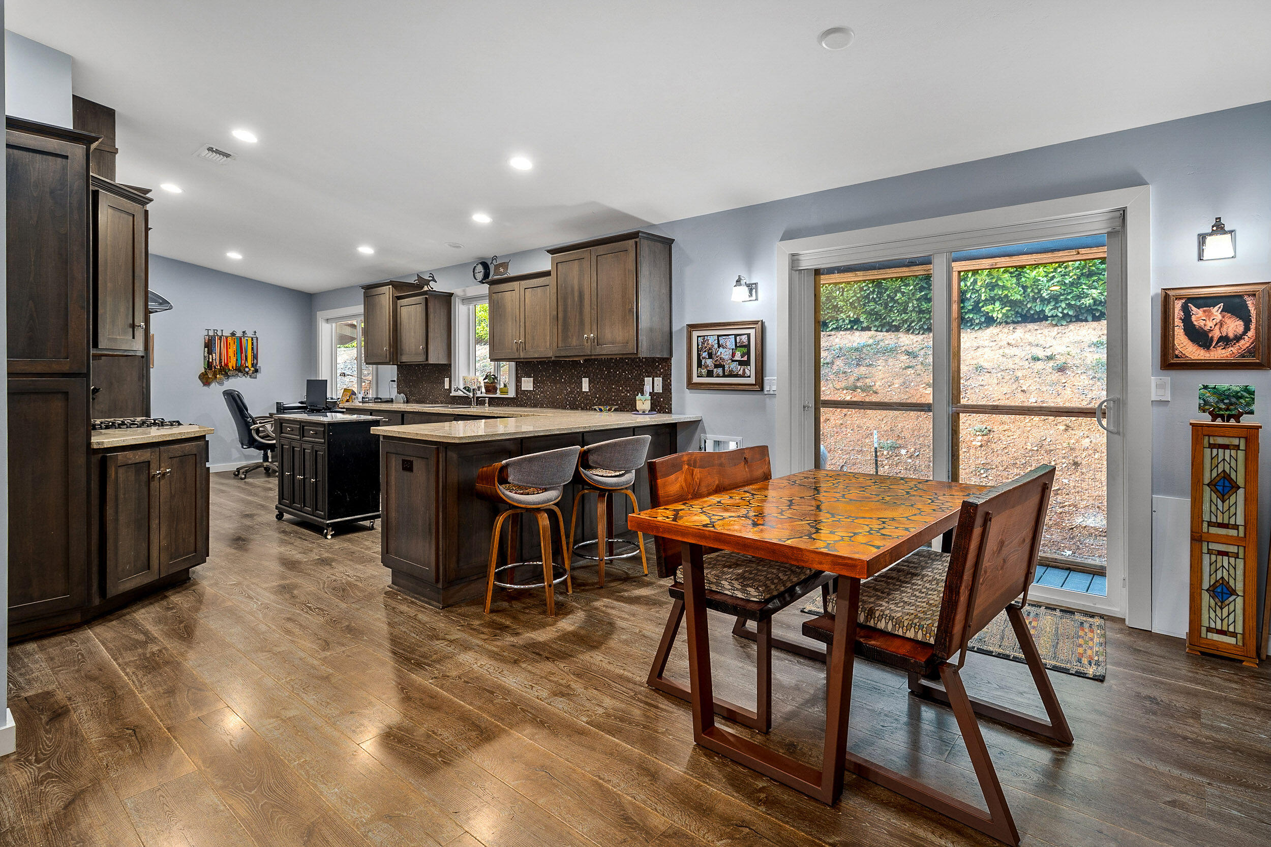 3425 Quartz Creek Road Merlin, OR 97532 - Photo 14 of 41 a view of a dining room with furniture and a window