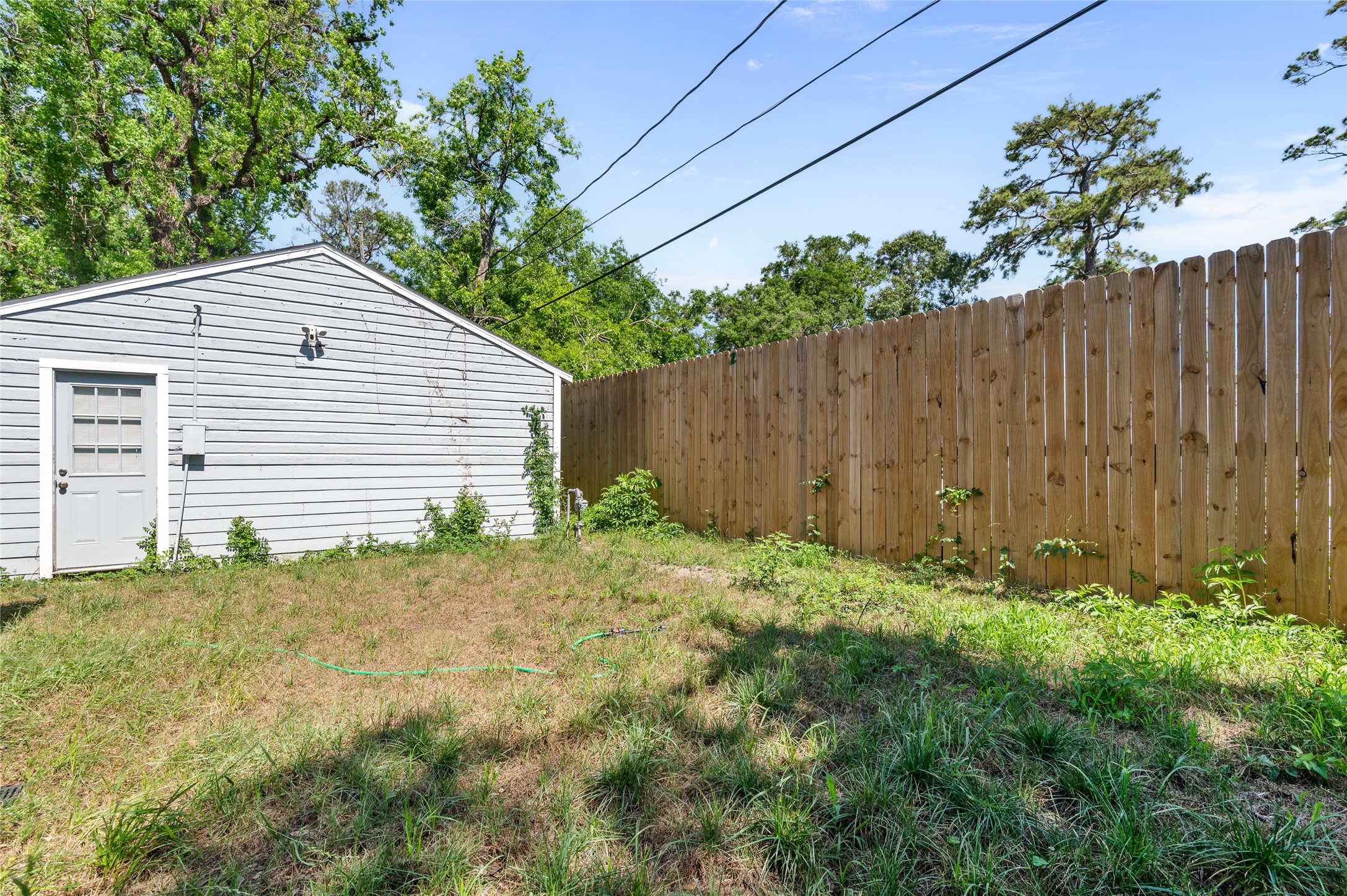 3853 Rosedale Street Houston, TX 77004 - Photo 46 of 50 Private backyard with newly added privacy fence.