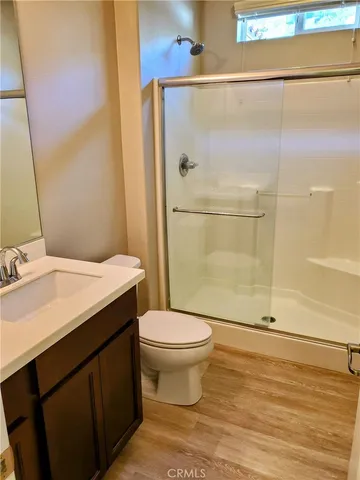 a view of a livingroom with a chandelier fan