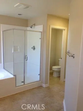 a view of a room with shelf on the wall