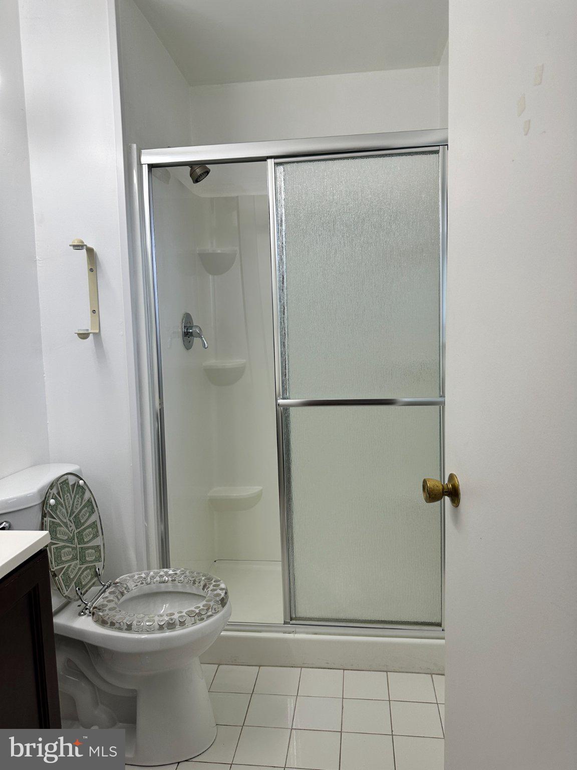 8336 Scotts Level Road Baltimore, MD 21208 - Photo 30 of 55 Modern bathroom with sleek fixtures.