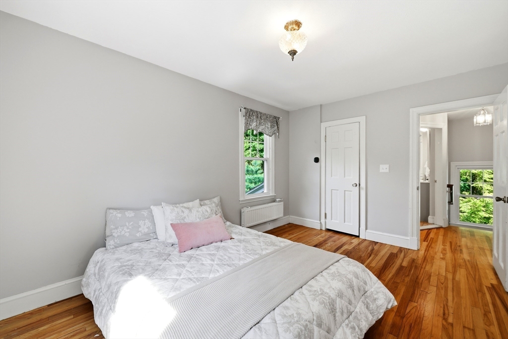 32 Lincoln Road Longmeadow, MA 01106 - Photo 21 of 36 a bedroom with a bed and a window