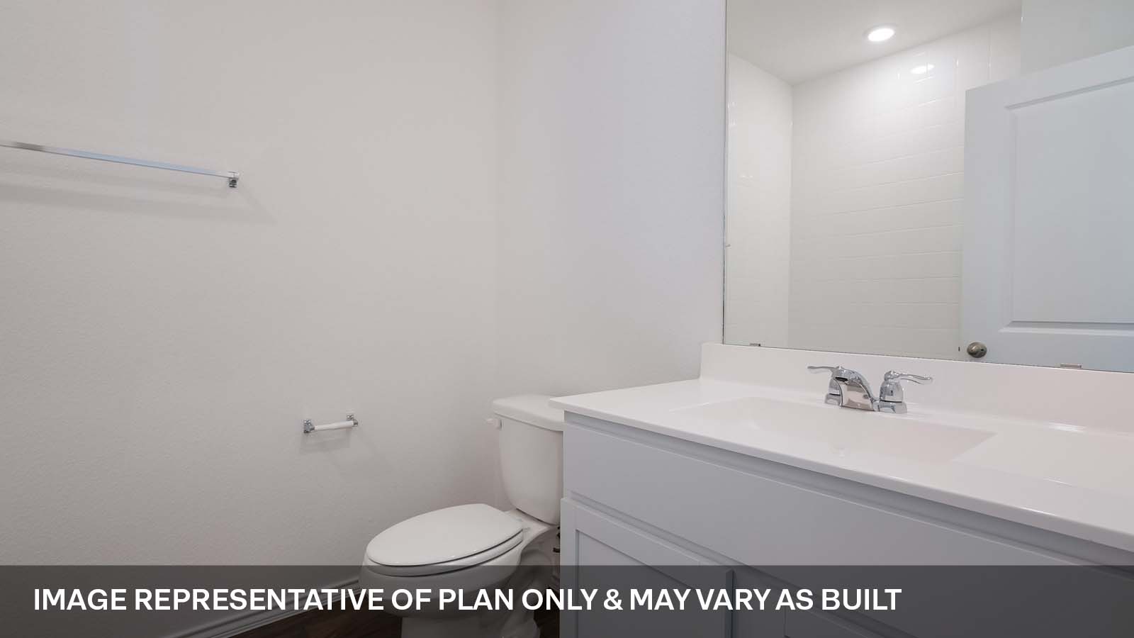 1165 Celosia Loop Kyle, TX 78640 - Photo 16 of 18 a bathroom with a sink a toilet and a mirror