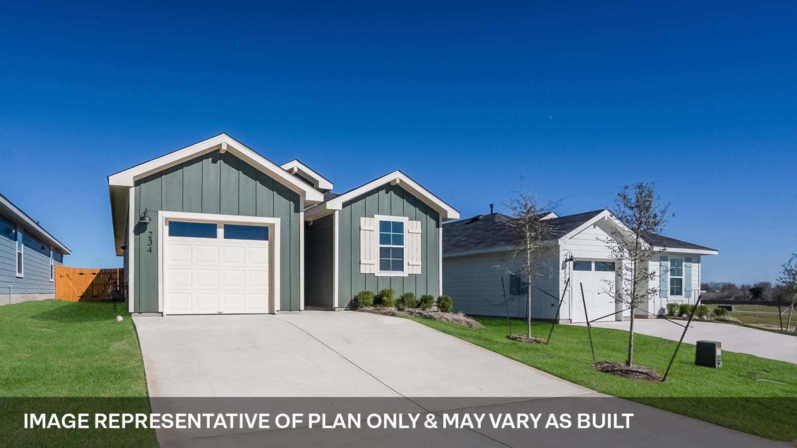 1165 Celosia Loop Kyle, TX 78640 - Photo 2 of 18 a view of a house with a yard and large trees