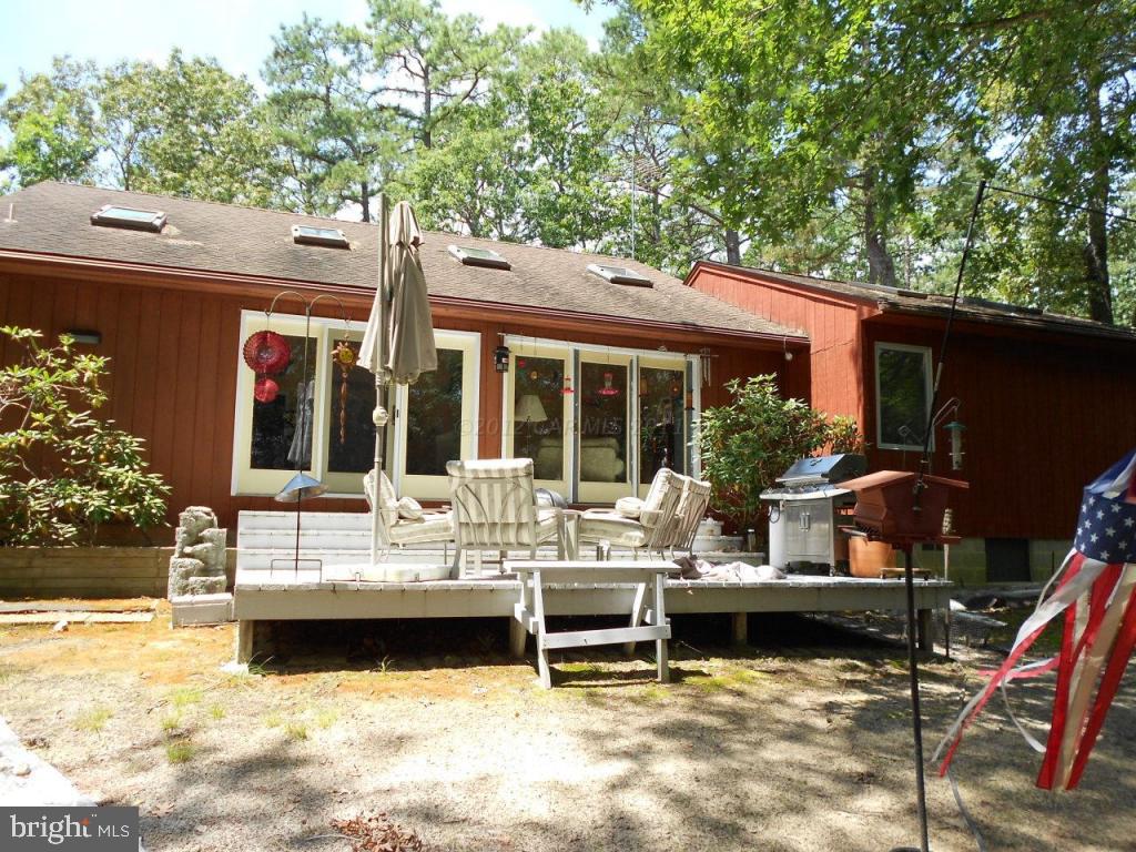 3679 Sand Road Snow Hill, MD 21863 - Photo 15 of 28 a view of house with yard outdoor seating and covered with large trees