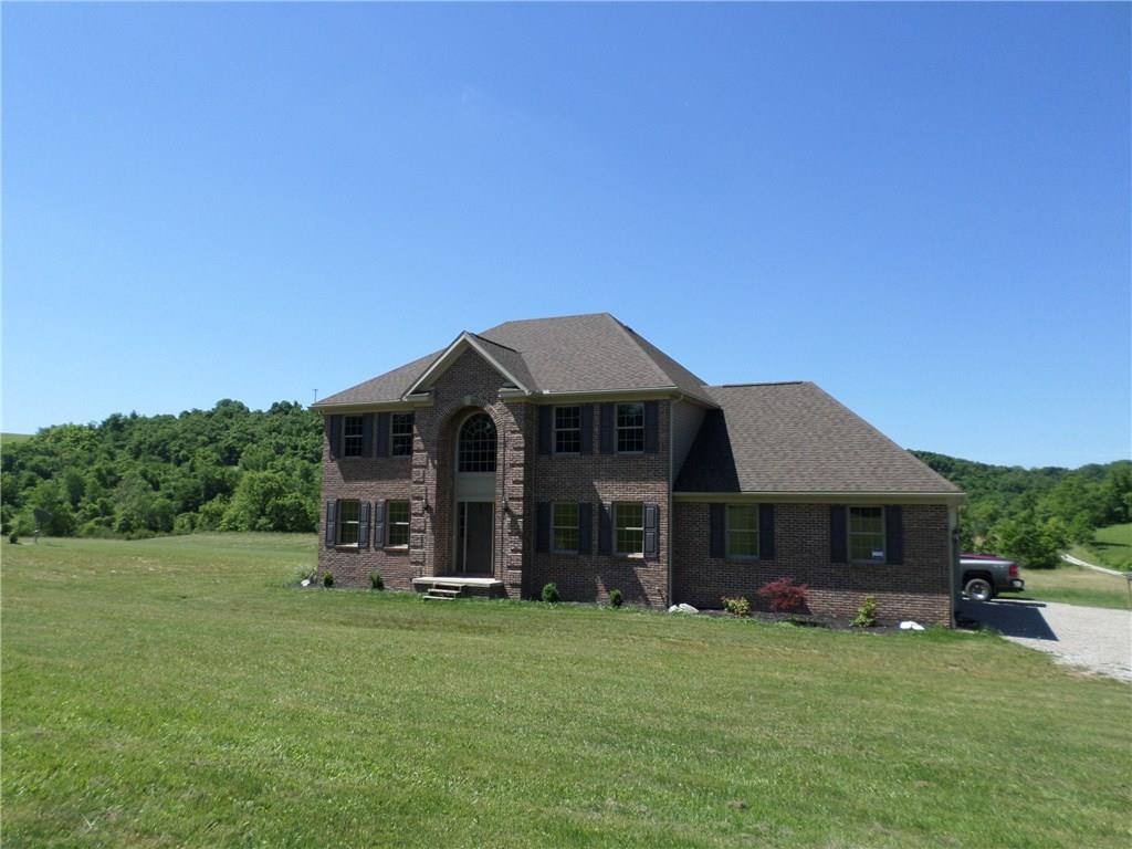 384 Harts Road Carmichaels, PA 15320 - Photo 1 of 25 GET AWAY FROM IT ALL - Set a new standard of living in this wonderful 6 year old custom built home with all the modern conveniences nestled on 3 perfectly level acres of ground with a 30 x 30 steel building