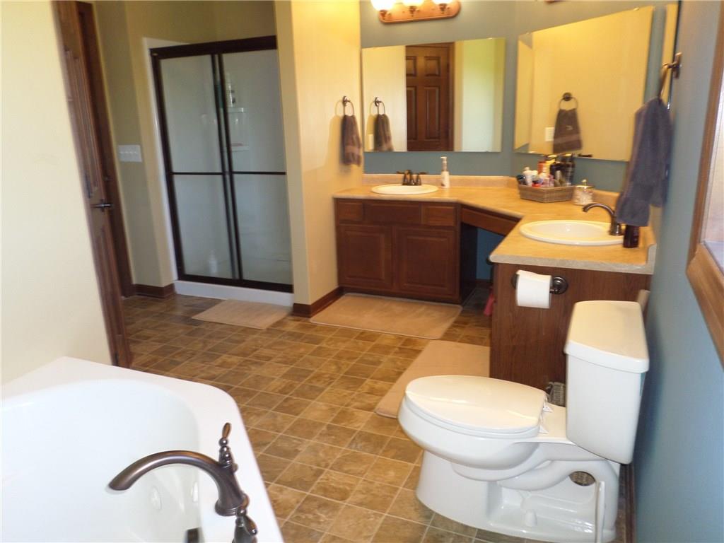 384 Harts Road Carmichaels, PA 15320 - Photo 12 of 25 Master bath has it all - whirlpool tub, shower, 2 sinks, lots of cabinetry