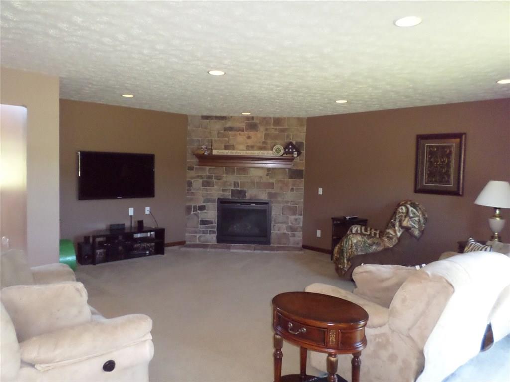 384 Harts Road Carmichaels, PA 15320 - Photo 5 of 25 This family room is open and spacious to the eat-in kitchen, has a gas log fireplace, and French doors off to the back of the property, recessed lighting