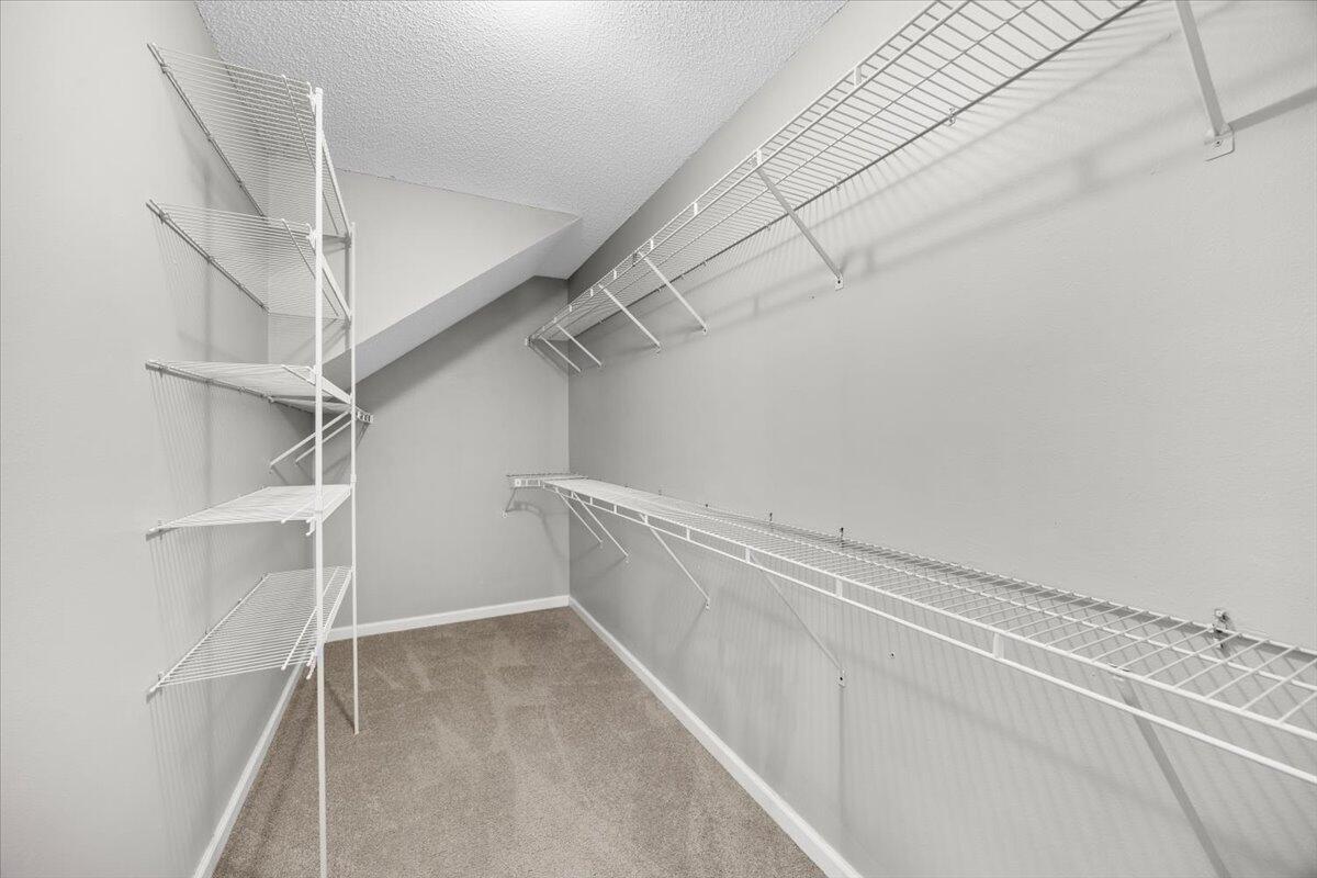 439 Northview Lane Crestview, FL 32536 - Photo 14 of 32 a view of a room with racks on the wall