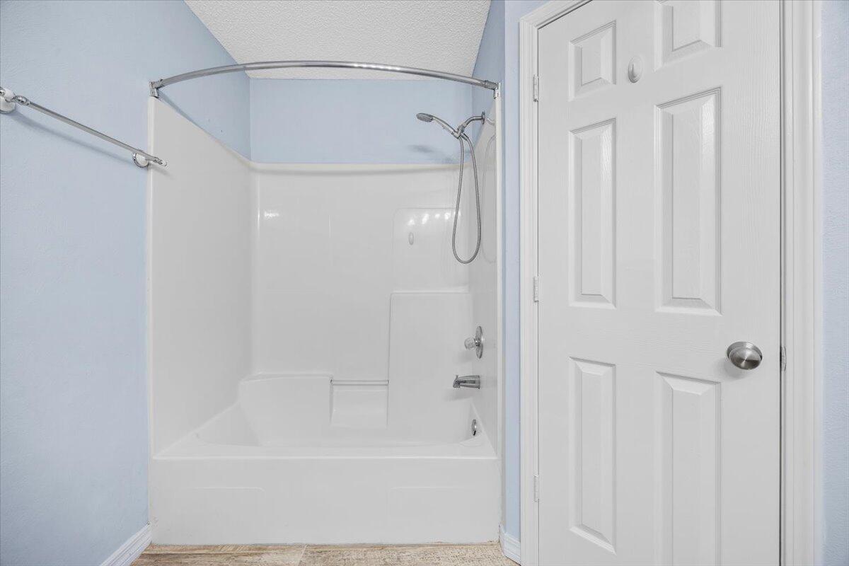 439 Northview Lane Crestview, FL 32536 - Photo 17 of 32 a bathroom with a shower