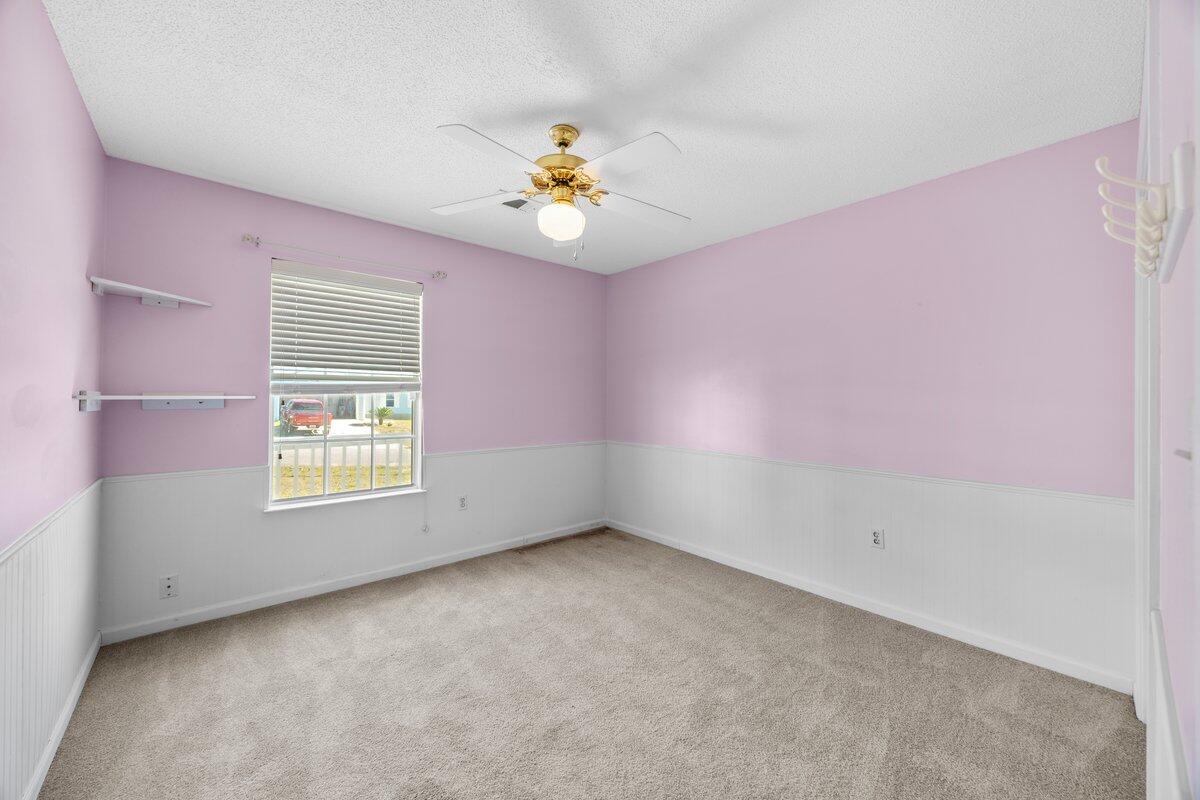 439 Northview Lane Crestview, FL 32536 - Photo 21 of 32 a view of an empty room with a window